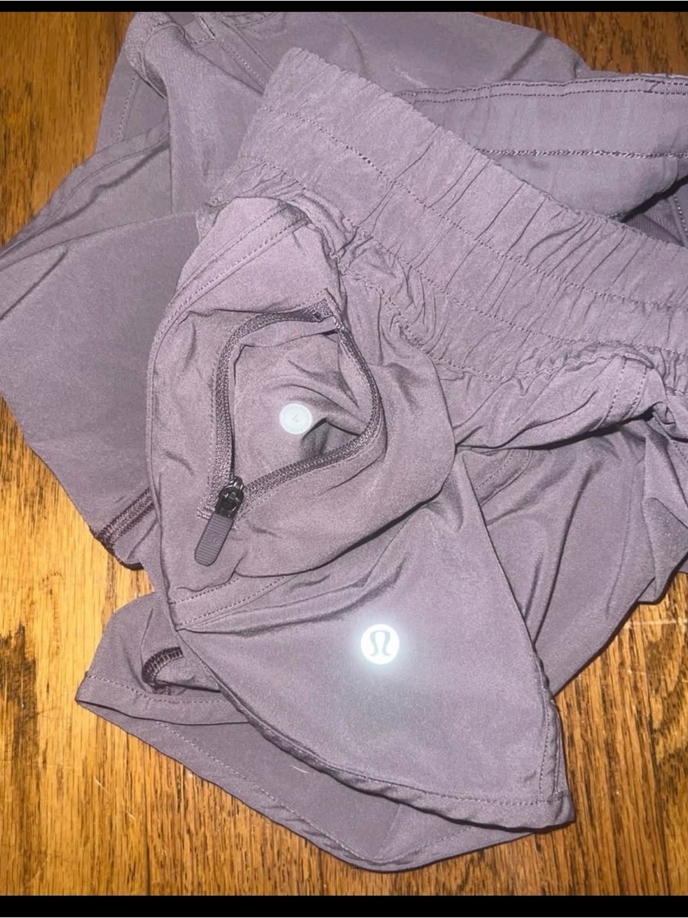 4" lululemon athletic shorts in dusty mauve with zip pocket